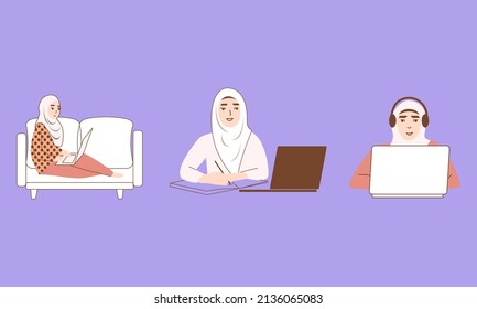 Muslim woman sitting with laptop.