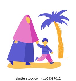Muslim woman is walking with her son holding hands