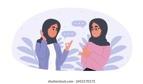 Muslim women communicate in sign language.