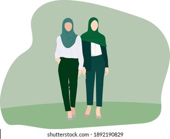 Muslim women in hijabs and office clothes outdoors 