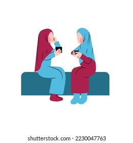 Muslim Women Talking While Sitting And Drinking Coffee