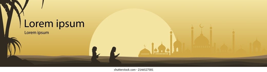 Muslims pray against the backdrop of sunset and mosque. 