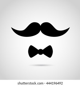 Mustache and bow - gentleman's accessories. Vector art.