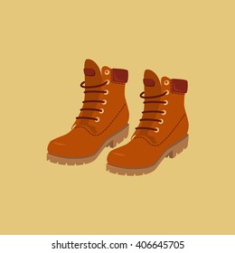 Mustard hiking boots. Vector isolated object.