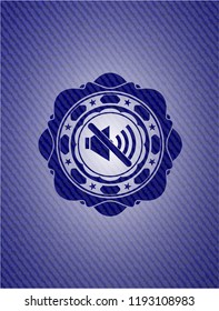 mute icon inside badge with denim texture