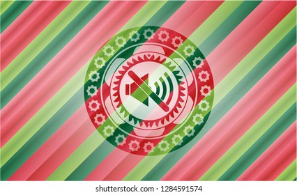 mute icon inside christmas colors badge.