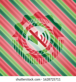 mute icon inside christmas colors style emblem.