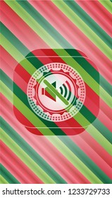 mute icon inside christmas emblem.
