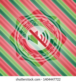 mute icon inside christmas emblem.