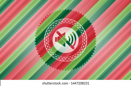 mute icon inside christmas emblem.