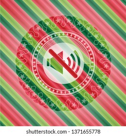 mute icon inside christmas style emblem.