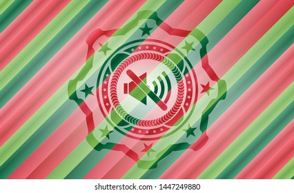mute icon inside christmas style emblem.