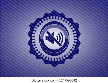 mute icon inside emblem with denim texture