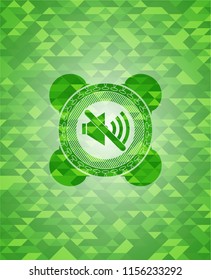 mute icon inside green emblem with mosaic background