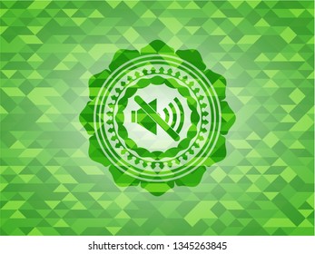mute icon inside green emblem with mosaic ecological style background