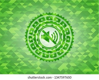 mute icon inside green mosaic emblem