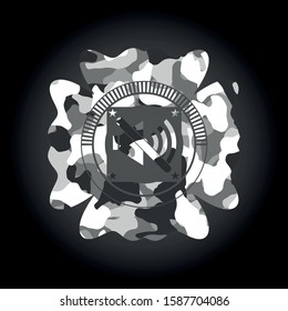 mute icon inside grey camouflaged emblem