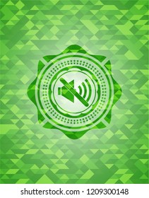 mute icon inside realistic green mosaic emblem