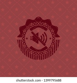 mute icon inside realistic red emblem
