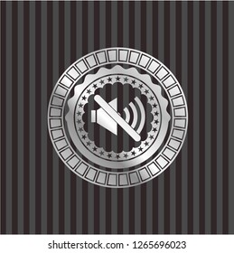mute icon inside silvery badge or emblem