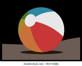 muted beach ball on sand with dark sky