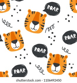 Muzzle of tigers, hand drawn backdrop. Colorful seamless pattern with muzzles of animals. Decorative cute wallpaper, good for printing. Overlapping background vector. Design illustration, roar