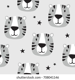 Muzzle of tigers and stars, hand drawn backdrop. Colorful seamless pattern with muzzles of animals. Decorative cute wallpaper, good for printing. Overlapping background vector. Design illustration