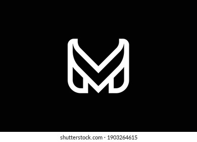 MV letter logo design on luxury background. VM monogram initials letter logo concept. MV icon design. VM elegant and Professional white color letter icon on black background.