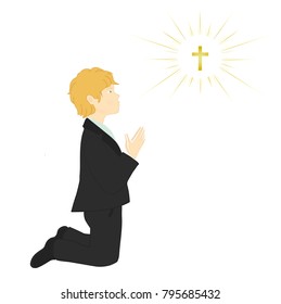 My first communion. Blonde boy praying on knees.