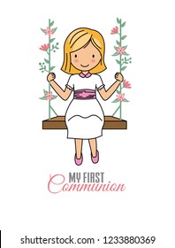 my first communion girl. Little girl dressed in communion on top of a swing