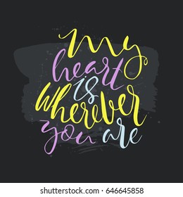 My heart is wherever you are text.Card with calligraphy.Handdrawn romantic lettering quote.Great for posters, mugs, apparel design, print.