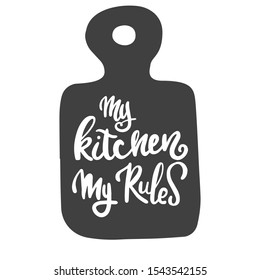 My kitchen is my rule. Motivational inscription. Hand lettering with brush and ink on a cutting board.