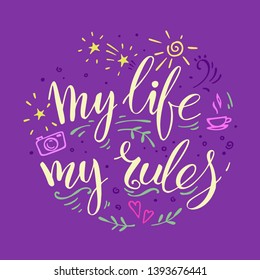 My life my rules. Handwritten quote with decorative elements such as sun, cup, camera, hearts, stars, curves, on purple background. Lettering design element for card. 