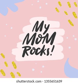 My mom rocks hand sketched calligraphy on textured doodle background. Mother's day greeting card template with hand drawn lettering and gold texture. Vector EPS 10