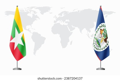  Myanmar and Belize flags for official meeting against background of world map.