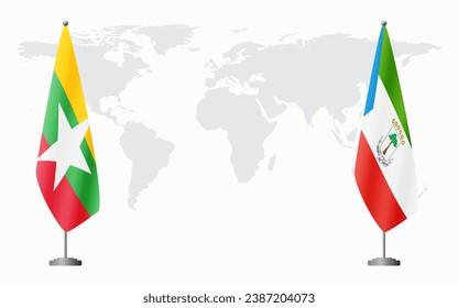  Myanmar and Equatorial Guinea flags for official meeting against background of world map.