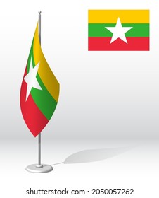 Bandera de MYANMAR en el asta para el registro de evento solemne, reuniéndose con invitados extranjeros. Día de la Independencia Nacional de MYANMAR. Vector 3D realista en blanco