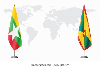  Myanmar and Grenada flags for official meeting against background of world map.