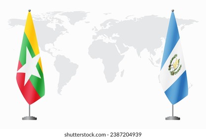  Myanmar and Guatemala flags for official meeting against background of world map.