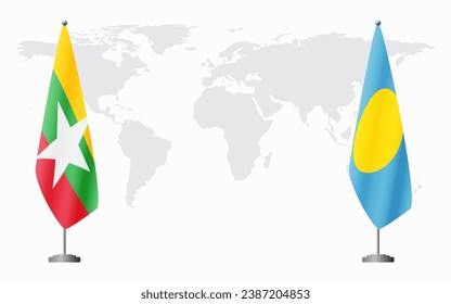  Myanmar and Palau flags for official meeting against background of world map.