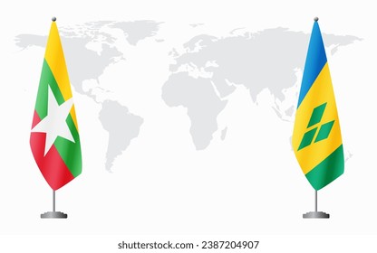  Myanmar and Saint Vincent and the Grenadines flags for official meeting against background of world map.