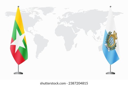  Myanmar and San Marino flags for official meeting against background of world map.