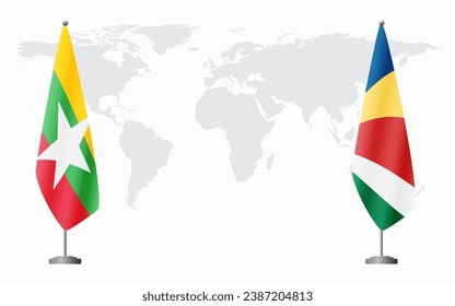  Myanmar and Seychelles flags for official meeting against background of world map.