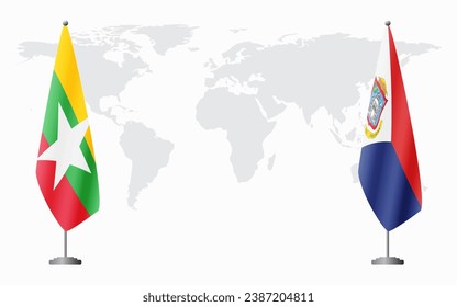  Myanmar y San Martín banderas para una reunión oficial en el fondo del mapa mundial.