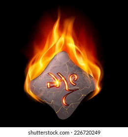 Mysterious rough stone with magic rune in orange flame