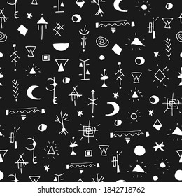 Mystical seamless pattern in the style of hand-drawn graphics. White print on black background