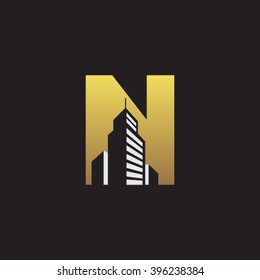 N alphabet building negative space letter logo gold black background