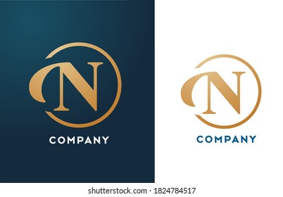 N alphabet letter logo icon in gold and blue color. Simple and creative golden circle design for business and company