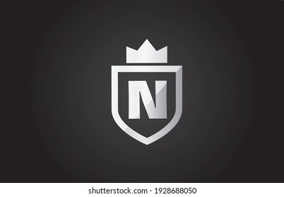 N alphabet letter logo icon in black and grey color. Shield design for company identity with king crown