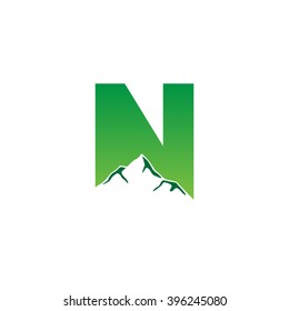 N alphabet mountain negative space letter logo green